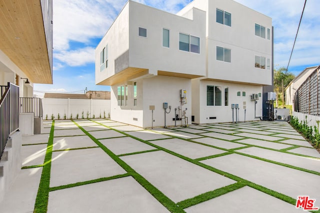 back of house featuring a patio area