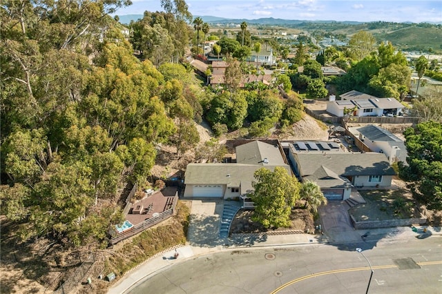 drone / aerial view featuring a mountain view