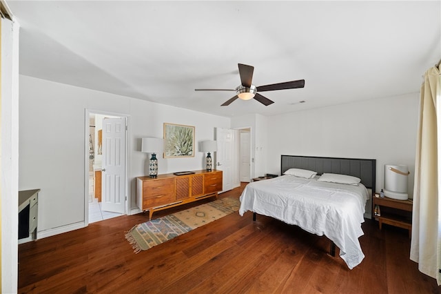 bedroom with ceiling fan and hardwood / wood-style floors