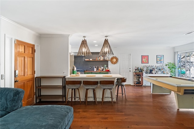 interior space featuring dark wood-type flooring and ornamental molding