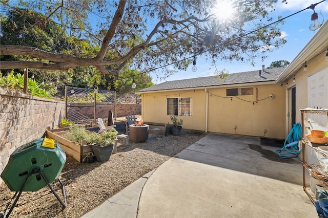 back of house featuring a patio