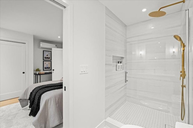 bathroom with an enclosed shower and an AC wall unit