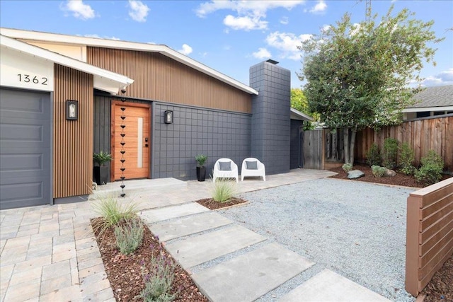 exterior space with a garage