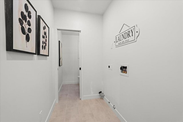 washroom with hookup for a washing machine, electric dryer hookup, and light tile patterned floors