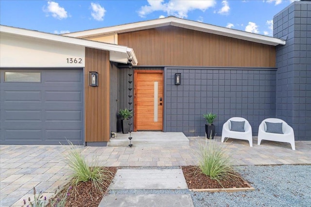 property entrance featuring a garage