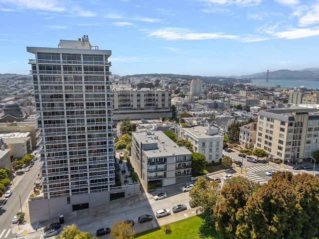 birds eye view of property with a mountain view