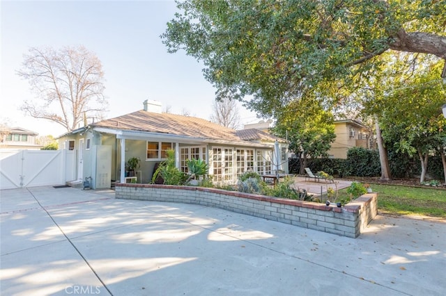 view of front of home featuring a patio