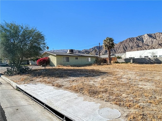 exterior space with a mountain view