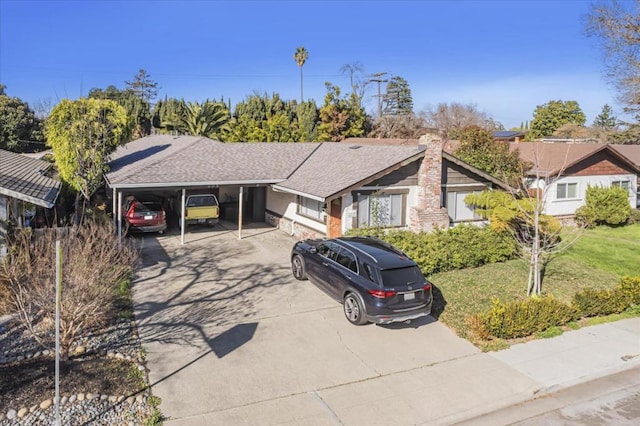 ranch-style home with a carport