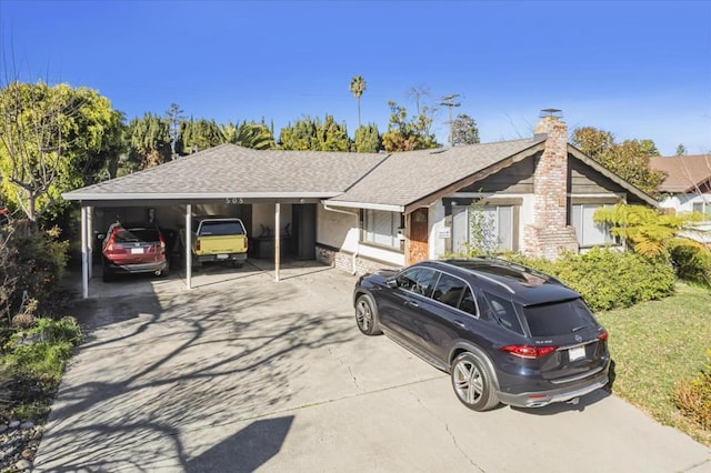 view of front of house featuring a carport