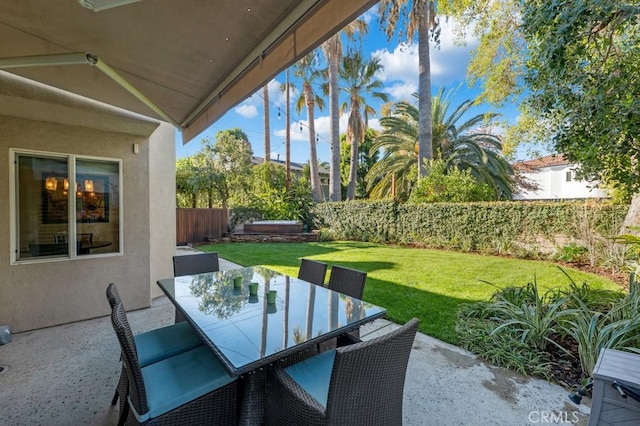 view of patio featuring a jacuzzi