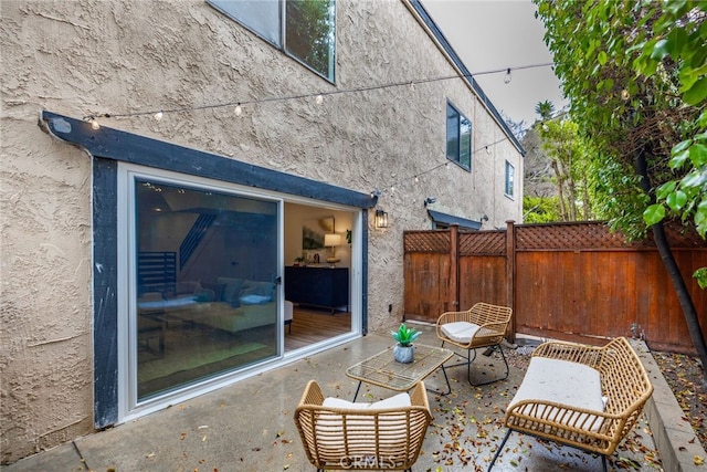 view of patio / terrace with fence