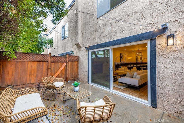 view of patio / terrace with fence