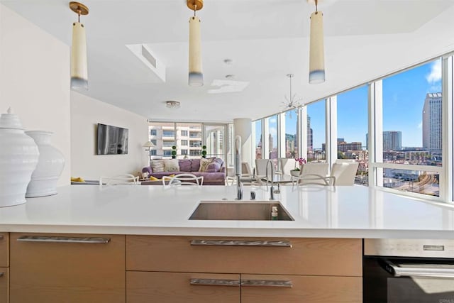 kitchen with sink and pendant lighting