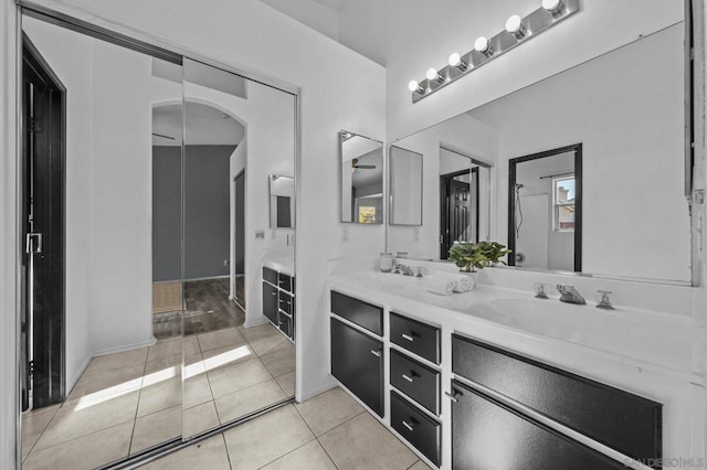 bathroom featuring vanity and tile patterned flooring