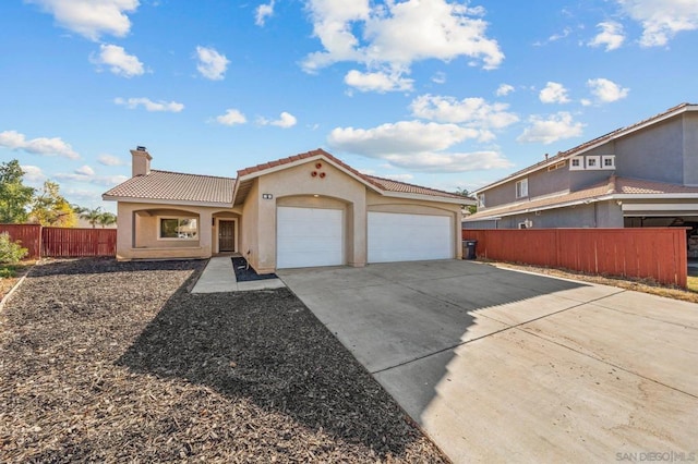 view of front of home with a garage