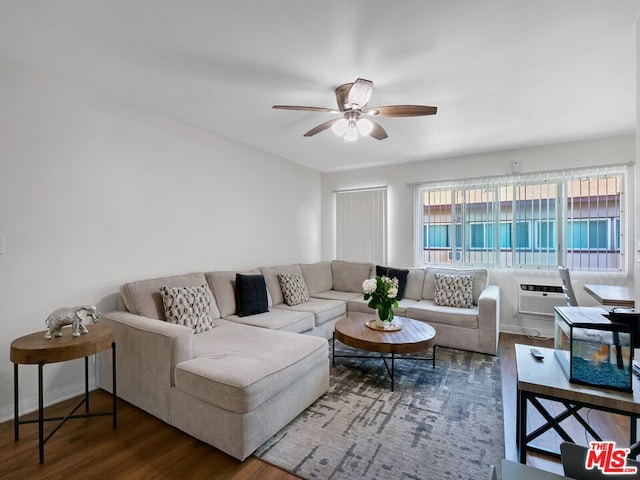 living room with ceiling fan, a wall mounted AC, and dark hardwood / wood-style flooring