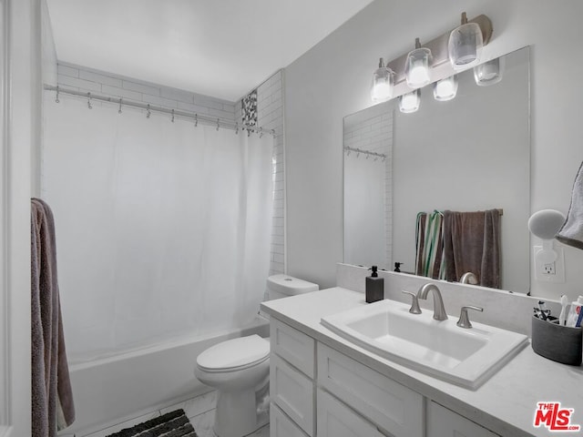 full bathroom featuring toilet, vanity, and shower / bath combo with shower curtain