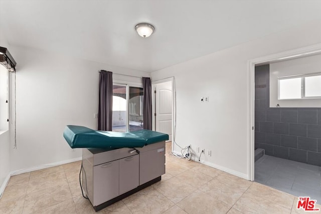 interior space with light tile patterned floors