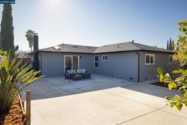 rear view of property featuring an outdoor hangout area and a patio