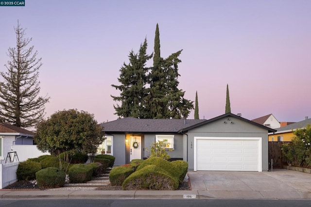 single story home with a garage