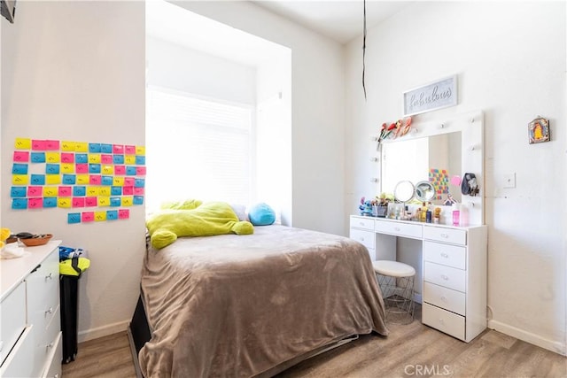 bedroom featuring light hardwood / wood-style floors