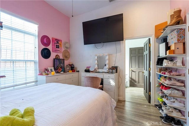 bedroom featuring hardwood / wood-style flooring