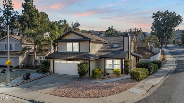 view of front of property featuring a garage