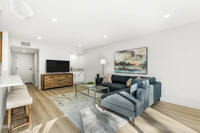 living room featuring light hardwood / wood-style floors