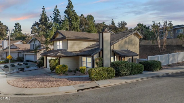 view of front of property featuring a garage