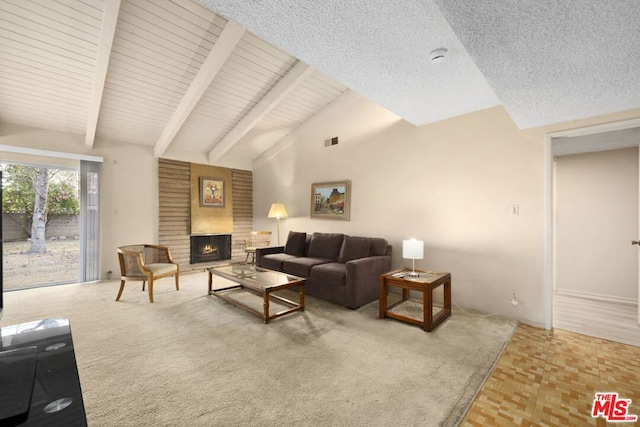 carpeted living room featuring beam ceiling, a brick fireplace, and high vaulted ceiling