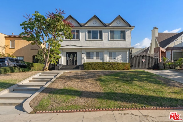 view of front of house with a front lawn