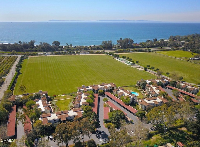 aerial view featuring a rural view and a water view