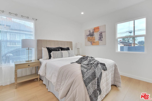 bedroom featuring light wood-type flooring