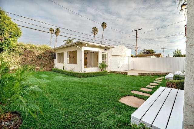 view of yard featuring a garage