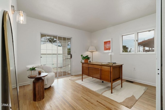 office area with light wood-type flooring