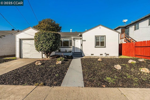 single story home featuring a garage