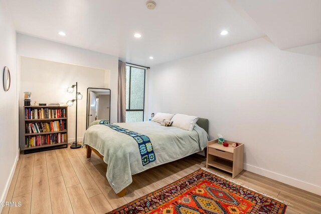 bedroom featuring light wood-type flooring