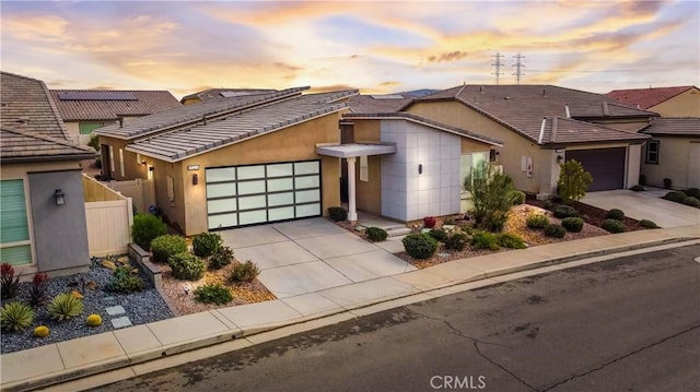 view of front of home with a garage