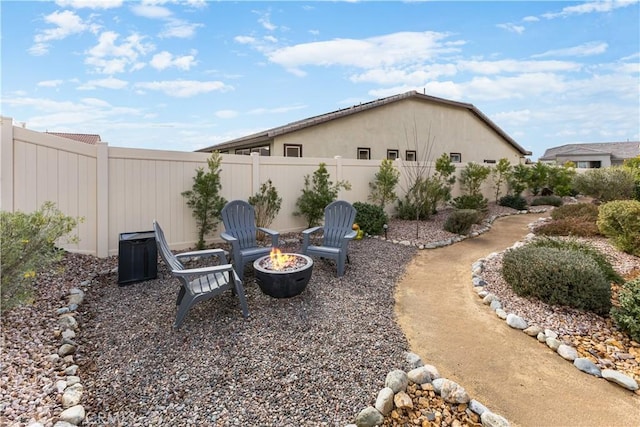 view of yard featuring a fire pit