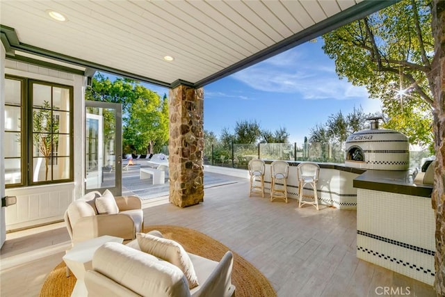 view of patio / terrace featuring a bar