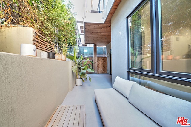 balcony with an outdoor hangout area