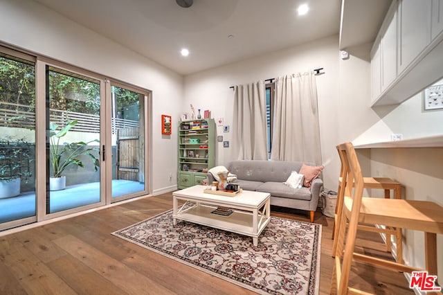 living room with hardwood / wood-style floors