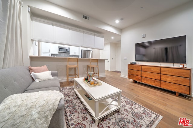 living room featuring light hardwood / wood-style floors