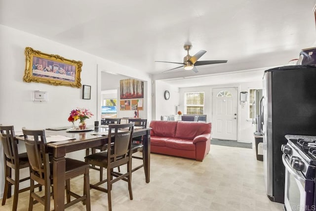 dining area with ceiling fan