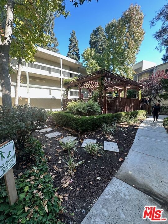 exterior space with a pergola