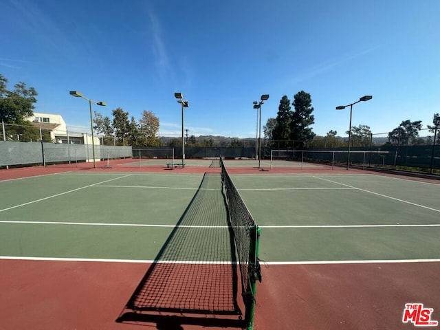 view of sport court featuring basketball court