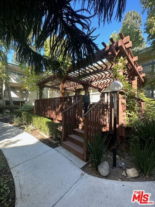 exterior space with a pergola