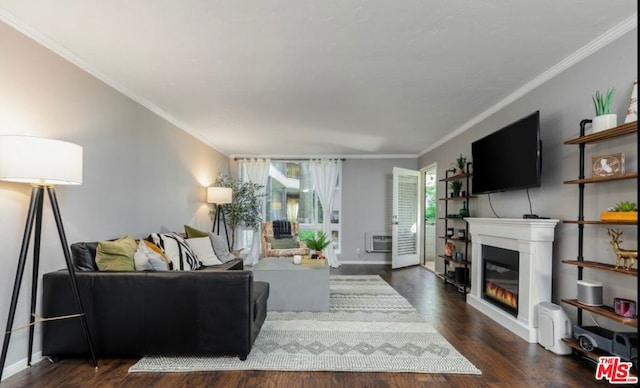 living room featuring dark wood-type flooring, crown molding, and a wall mounted air conditioner