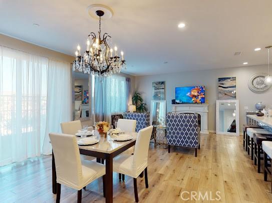 dining space featuring light hardwood / wood-style floors